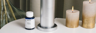  Miamo Aroma Magic Miami fragrance oil with Midi diffuser on a table for ambient scenting